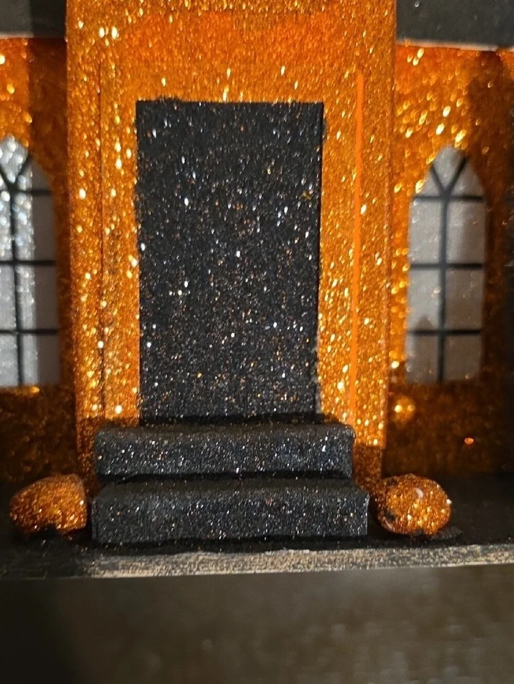 Glittery Orange & Black Haunted House Décor